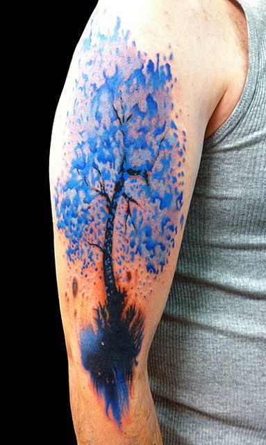 Blue tree tattoo