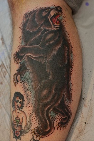 Brown bear tattoo
