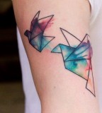 Colorful birds geometric tattoo
