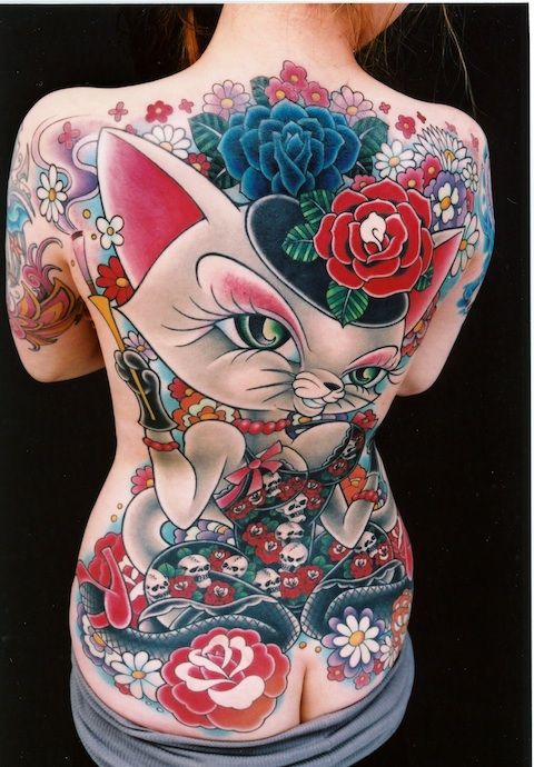 Colorful cat and skull tattoo