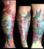 Colorful skull tattoo by Michael Norris