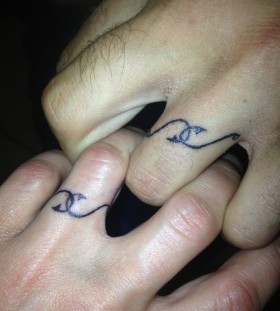 Couple fingers tattoo