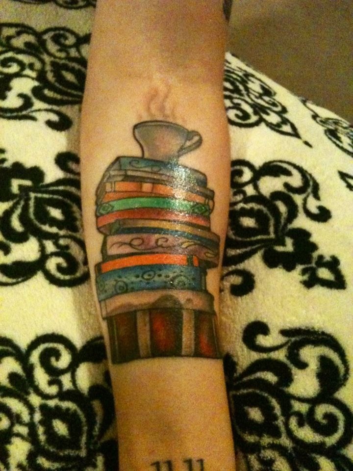 Cup and books tattoo