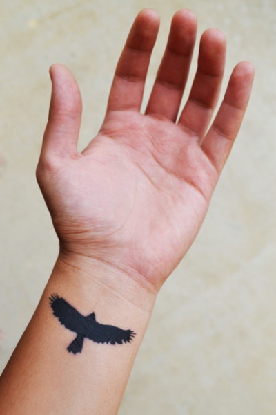 Cute black eagle tattoo