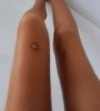 Cute sun tattoo