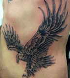 Eagle tattoo on ribs