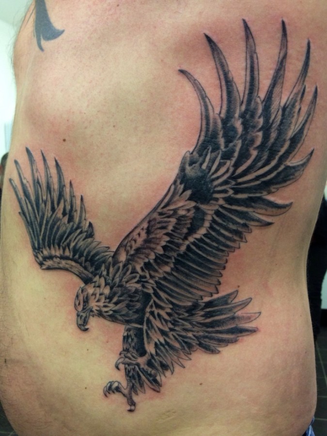 Eagle tattoo on ribs