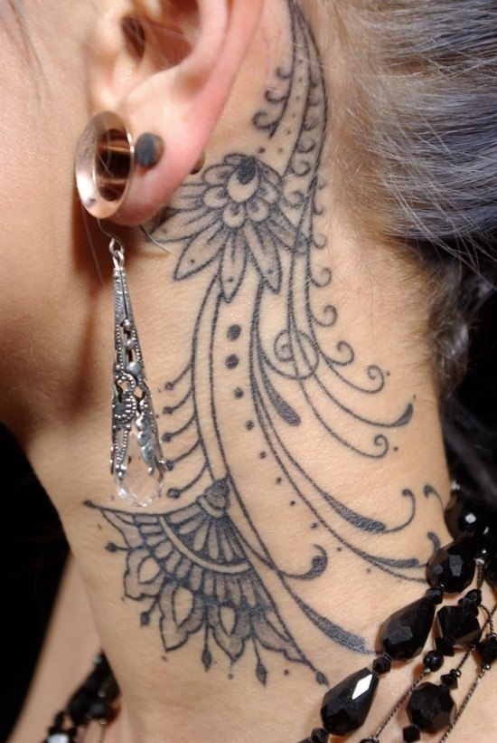 Ear woman tattoo