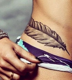 Feather hip tatoo