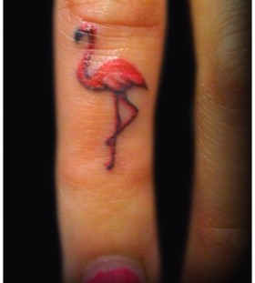 Flamingo tattoo on finger
