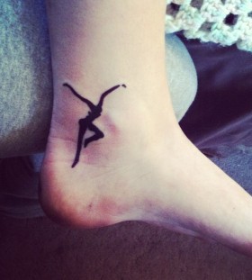 Foot and leg dancer tattoo