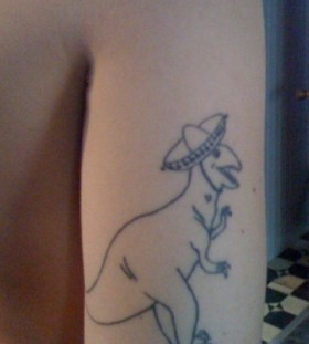 Funny dinosaur tattoo