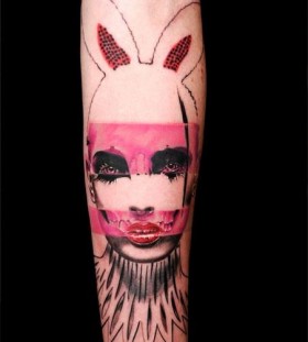 Girl with rabbit ear tattoo by Volko Merschky