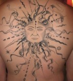 Gorgeous back sun tattoo