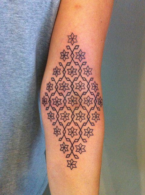 Gorgeous geometric tattoo