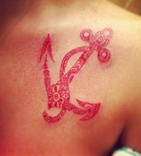 Great looking red inchor tattoo