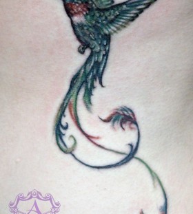 Green bird tattoo by Sean Ambrose