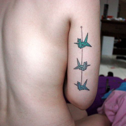 Green birds origami tattoo