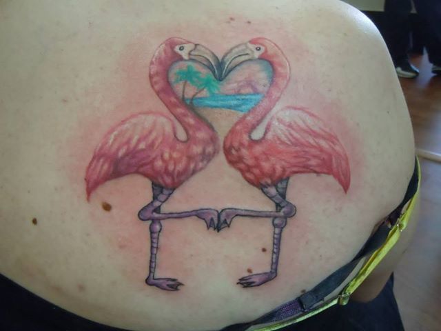Heart and flamingo tattoo