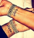 His and  her couples tattoo