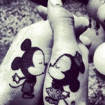 Kiss tattoo with disney mouse