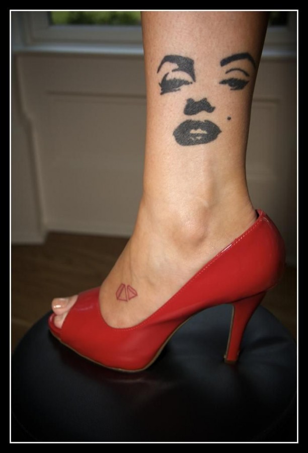 Legs tattoo with Marilyn Monroe