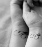 Letter couples tattoo