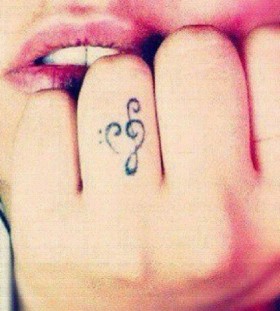 Lips and music tattoo
