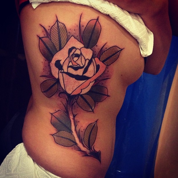 Lovely rose tattoo by Aivaras Lee
