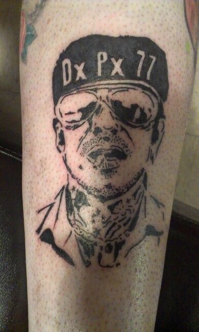 Man with glasses tattoo by Duane