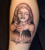 Marilyn Monroe and gun tattoo