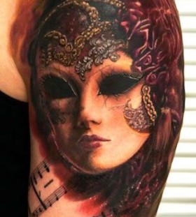 Masks tattoo by Andy Engel