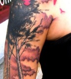 Pink birds and trees tattoo