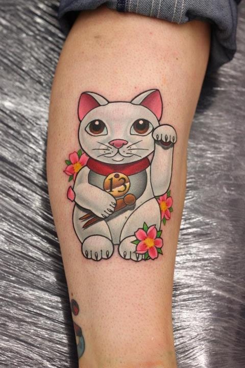 Pretty cat tattoo by Michelle Maddison