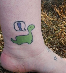 Pretty green dinosaur tattoo