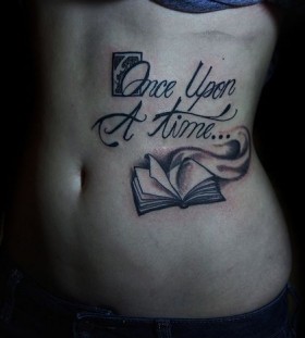 Quote and book tattoo