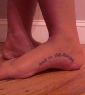 Quote dancer tattoo on foot