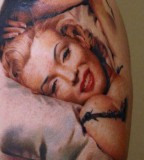 Realistic Marilyn Monroe tattoo