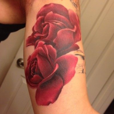 Realistic rose red tattoo