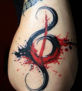 Red and black music tattoo