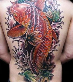 Red fish tattoo on man back