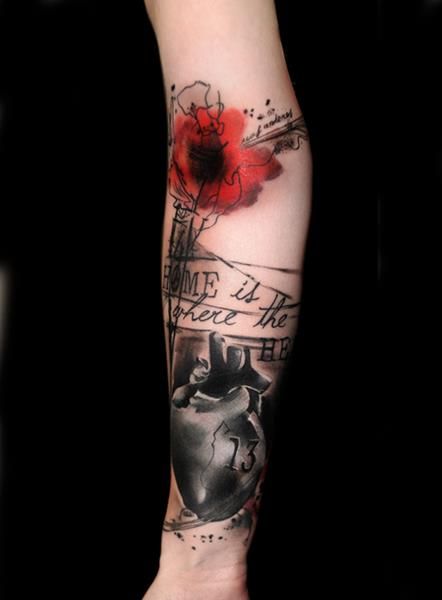 Red flower tattoo by Volko Merschky