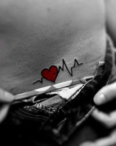 Red heart tattoo