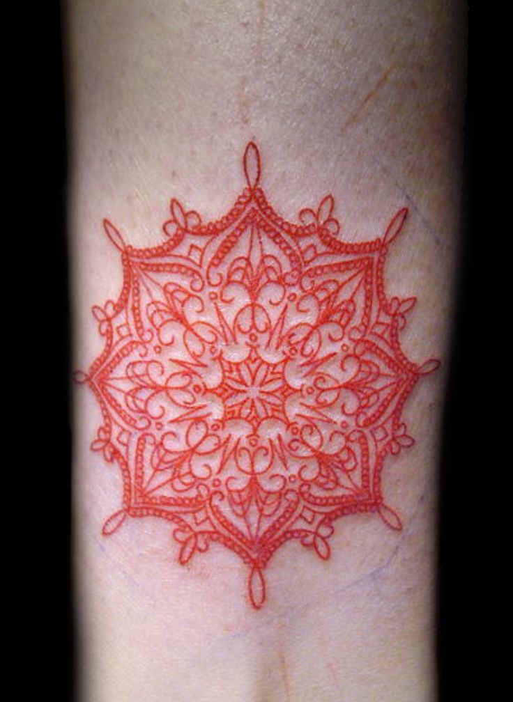 Red ornaments tattoo
