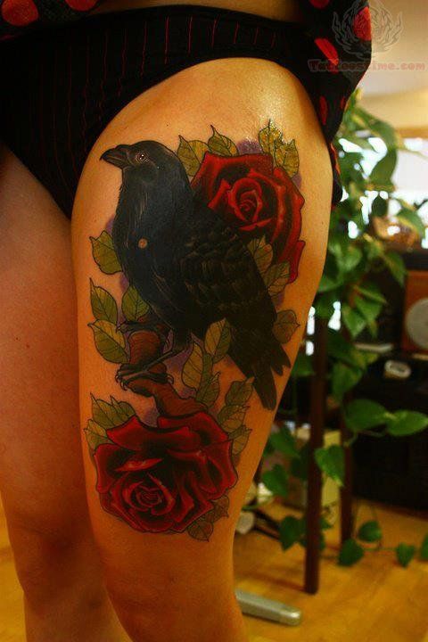 Red rose and crow woman tattoo