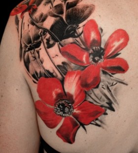 Red tattoo by Volko Merschky