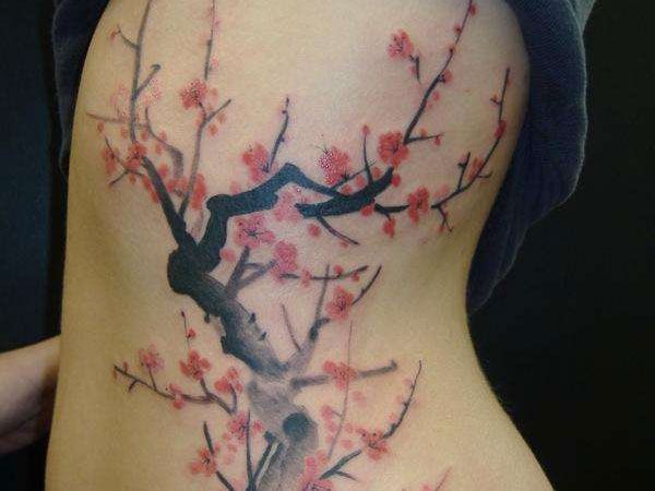 Red tree tattoo