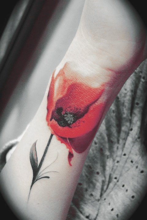 Red watercolor tattoo