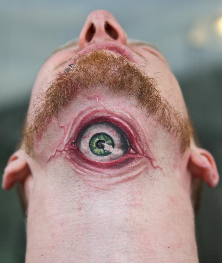 Scary eyes tattoo