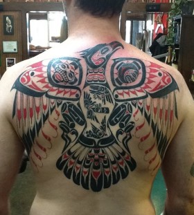 SirLexi Rex tattoo black and red bird on back